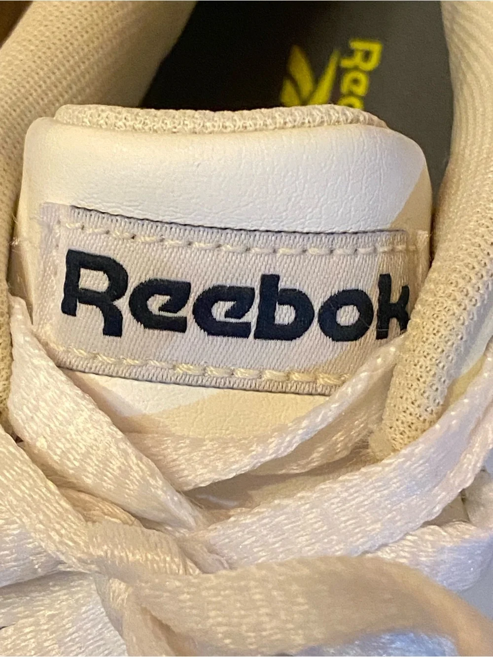 Reebok Women’s Ortholite White Athletic Sneakers with Navy Accents